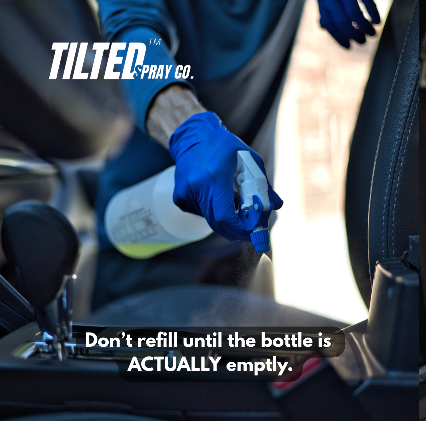 Person cleaning car interior with Tilted Spray Co. product, wearing blue gloves.