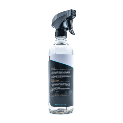 Clear spray bottle with black nozzle on a white background