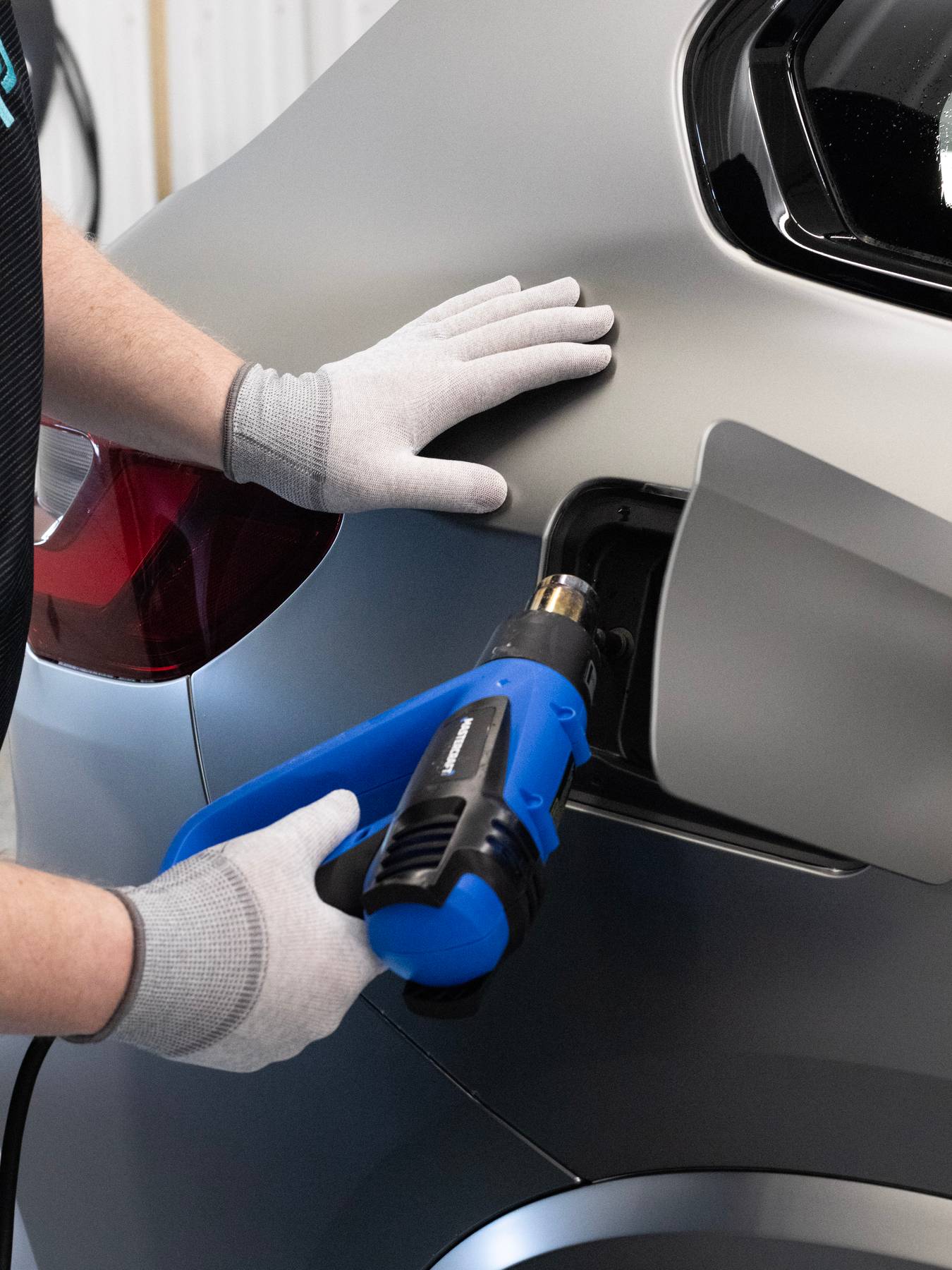 Person post heating ppf with a heat gun