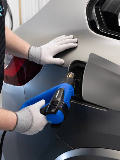 Person post heating ppf with a heat gun