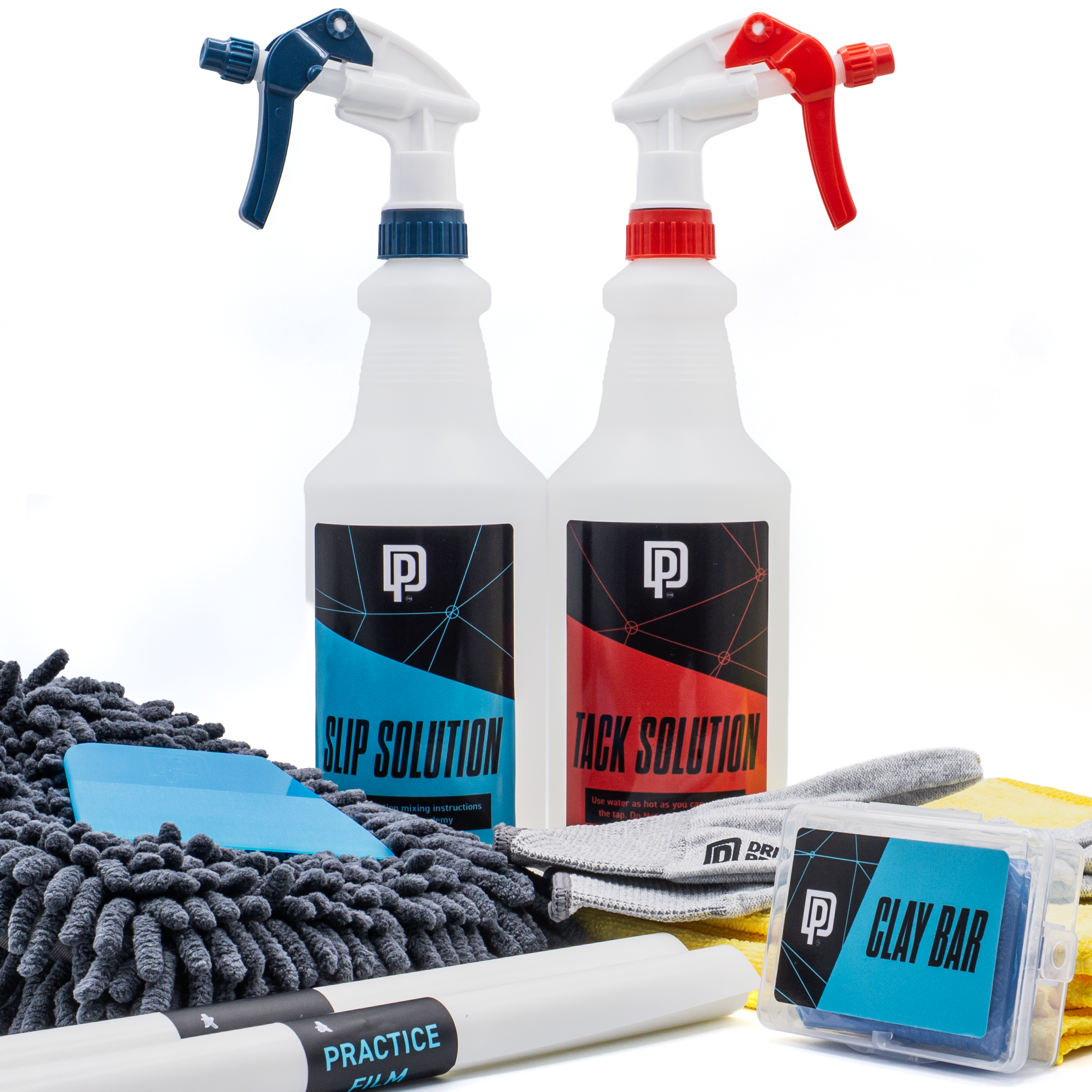PPF Installation Kit including spray bottles, a towel, and a clay bar on a white background
